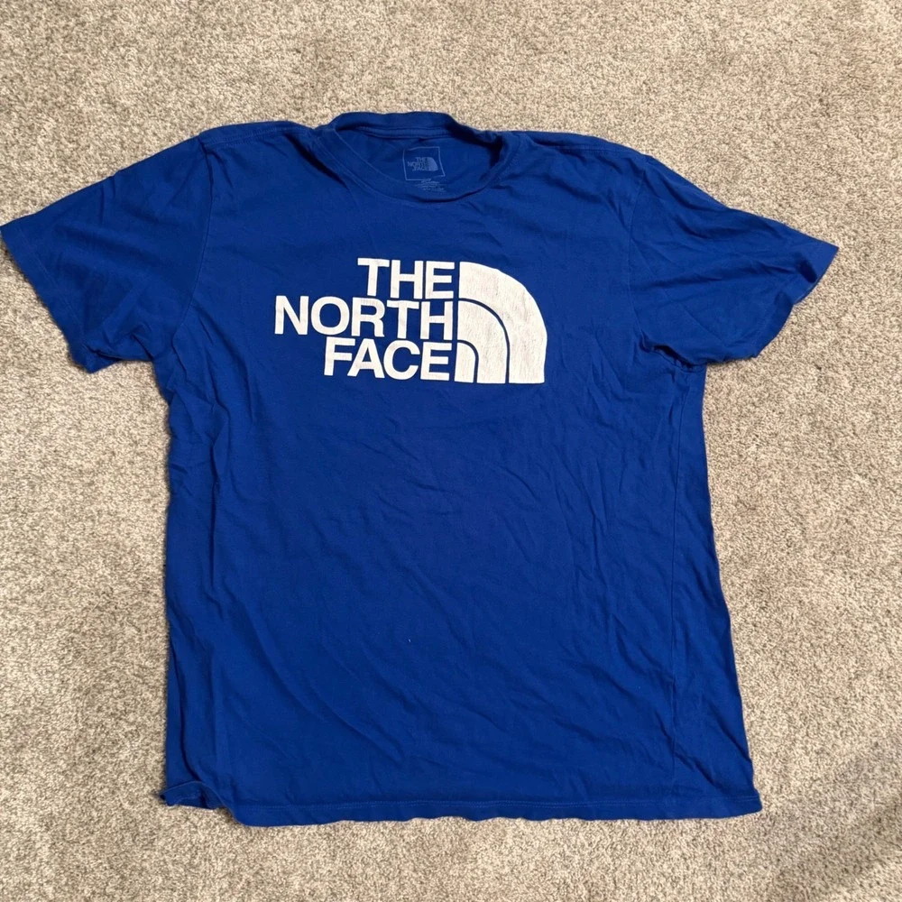 The North Face Mens Royal Blue Graphic Logo T-Shirt Size Large Circular Design